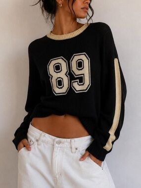 Le Lis Black Sweater with Cream Trim & '89 Graphic